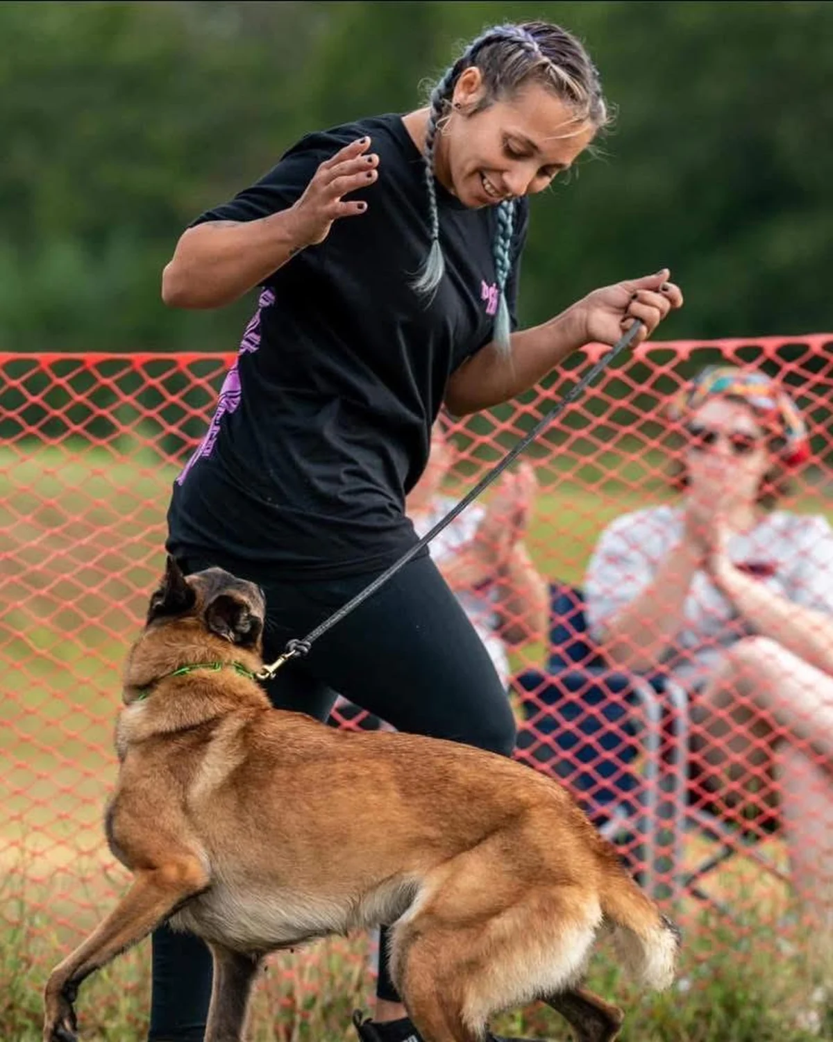 Kristen, owner and trainer, working with a dog at Unleashed Canine in Nederland, TX